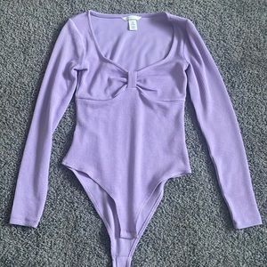 purple body suit